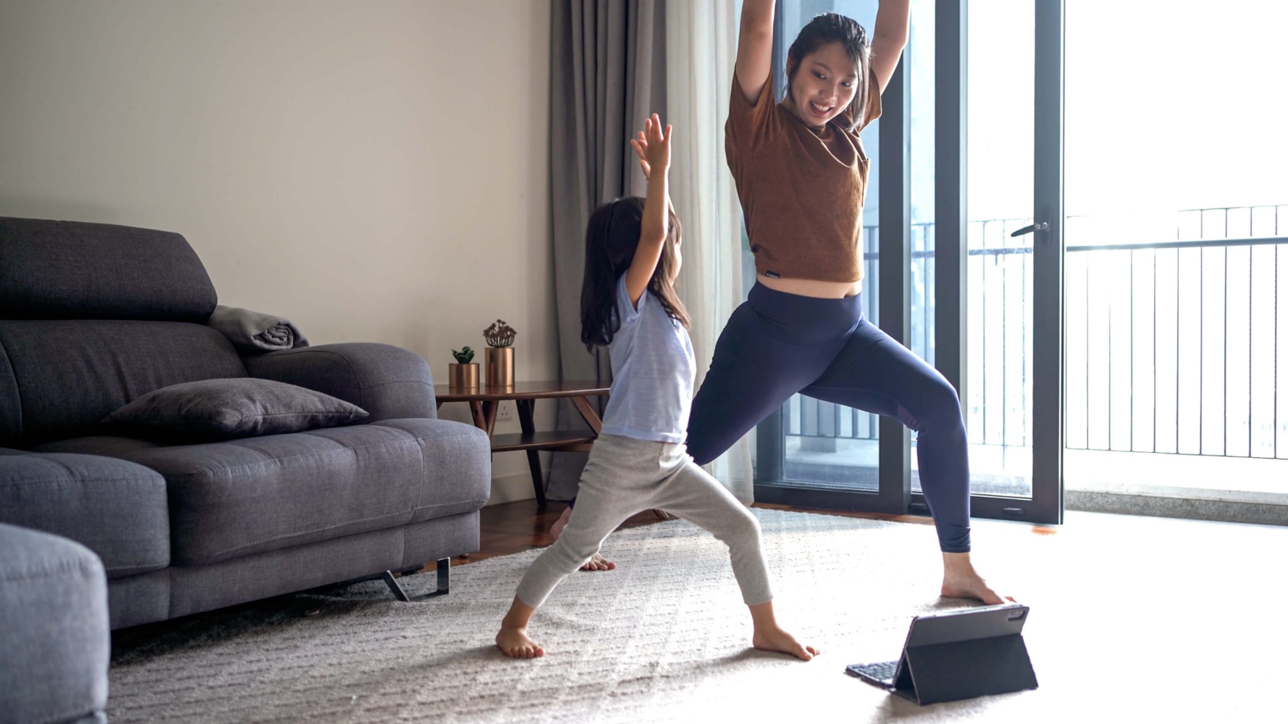 mom-and-daughter-doing-yoga